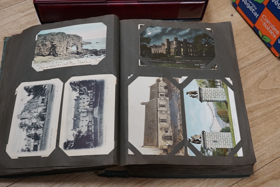 A collection of early 20th century postcards, photographs, etc. Including three albums of novelty postcards, scenes of London, etc. First World War postcards, etc. and an Edwardian photograph album, together with four bo